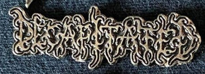 Decapitated Metal Badge